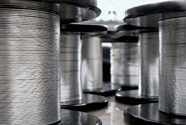 High-Performance Textile Batteries Made by the Spool  image