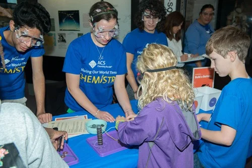 students at outreach event