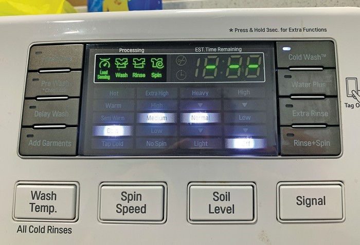 Front of washing machines with buttons displayed