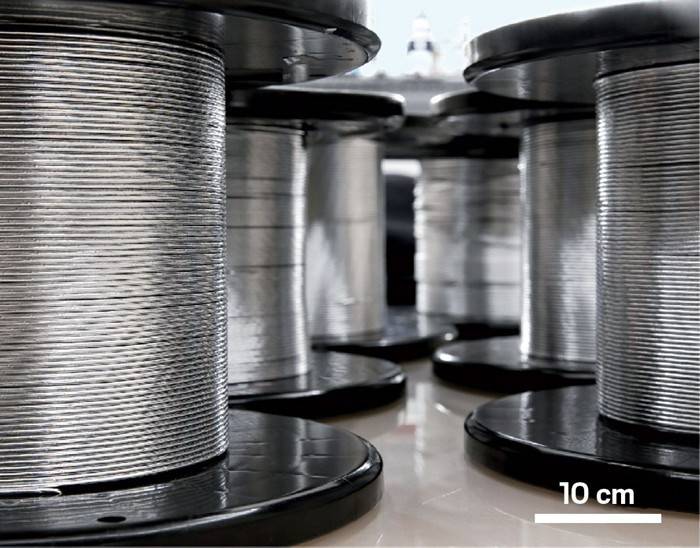 Spools of graphite and lithium cobalt oxide coated wires