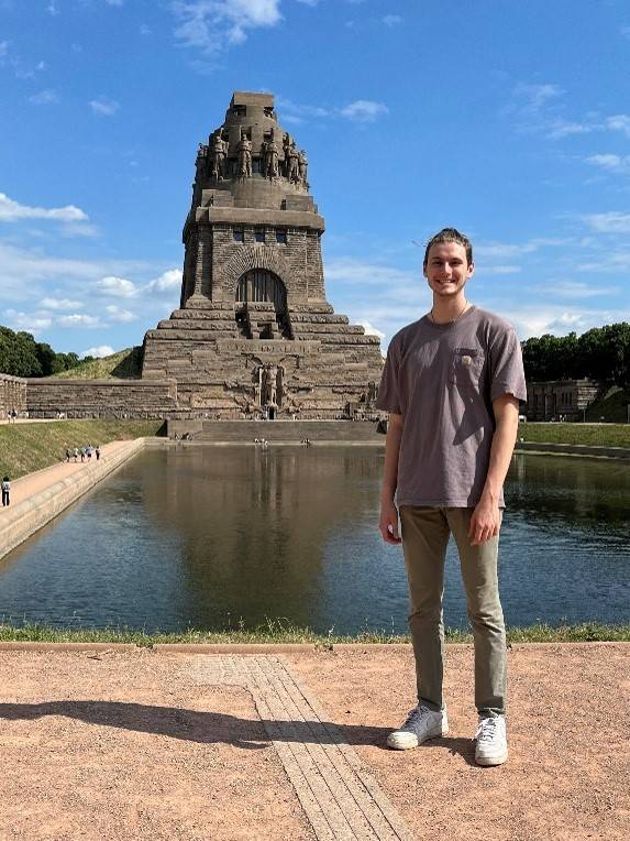 Adam Klinger in front of monument