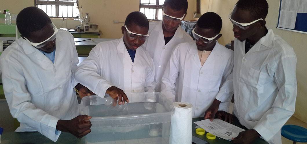 students for Sokoto State University perform science experiments during conference